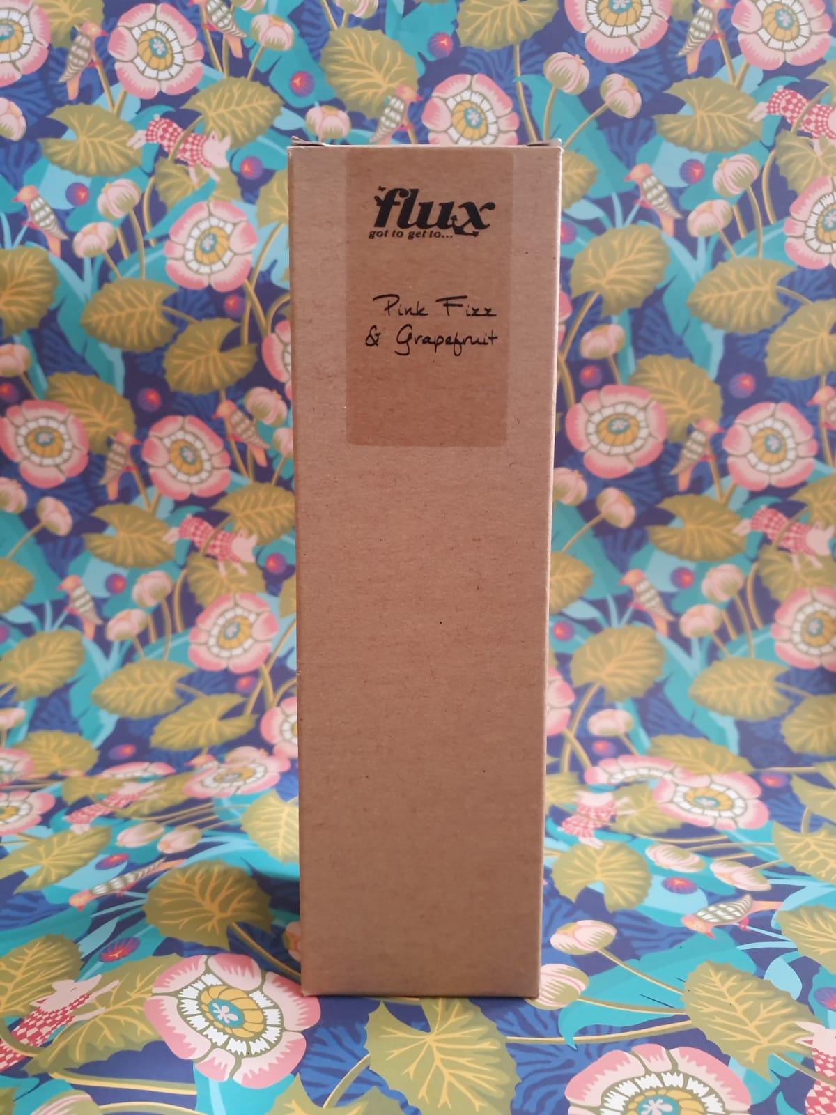 flux glass bottle reed diffuser with brown cardboard box