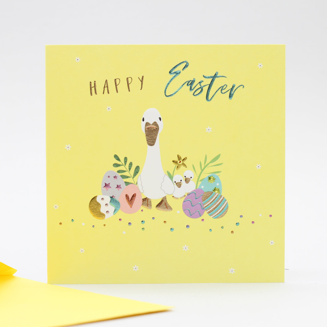 duck with eggs and happy easter words
