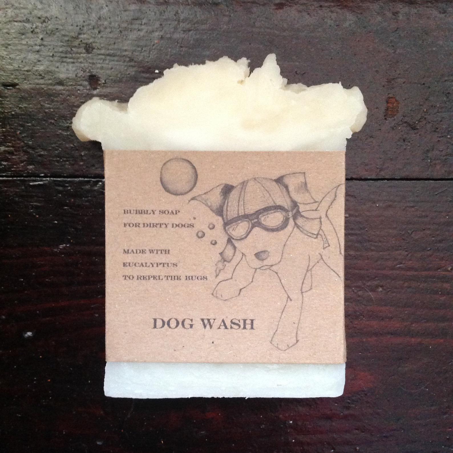White handmade soap with brown paper packaging , dog pic in goggles.